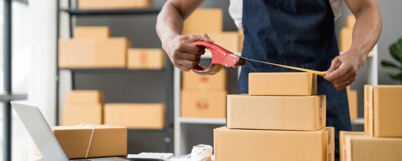 Shipping operative measuring package dimensions to calculate dimensional weight in a warehouse