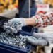 Screws and fasteners to be counted by weight with Industrial parts counting scale on a factory bench