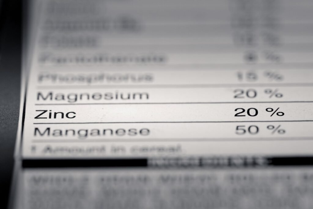 Laboratory data sheet showing ten replicate weighing results and standard deviation calculation for analytical balance precision verification