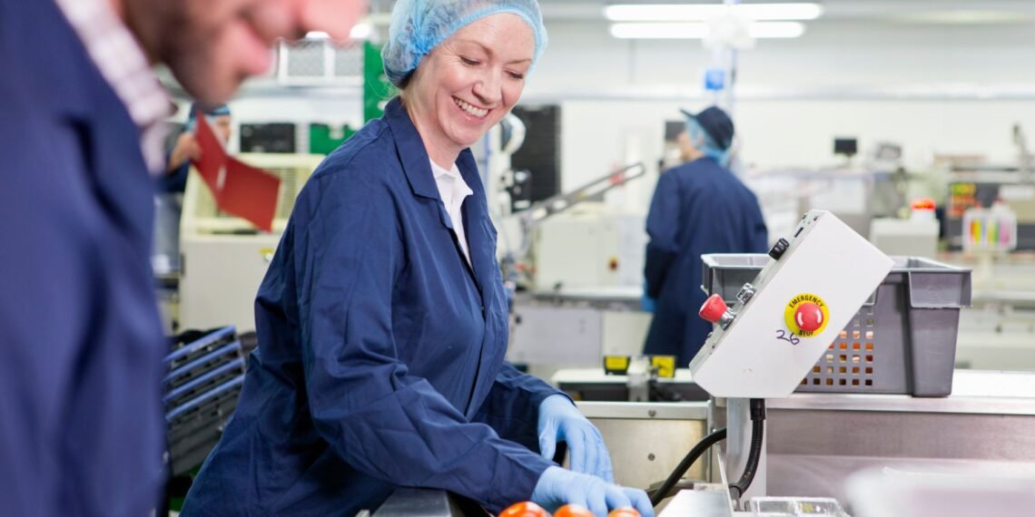 In-motion checkweigher on a food production line verifying net content compliance of packaged products against NIST Handbook 133 MAV requirements