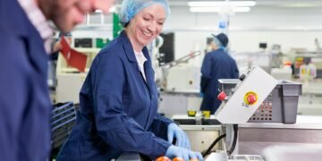 In-motion checkweigher on a food production line verifying net content compliance of packaged products against NIST Handbook 133 MAV requirements