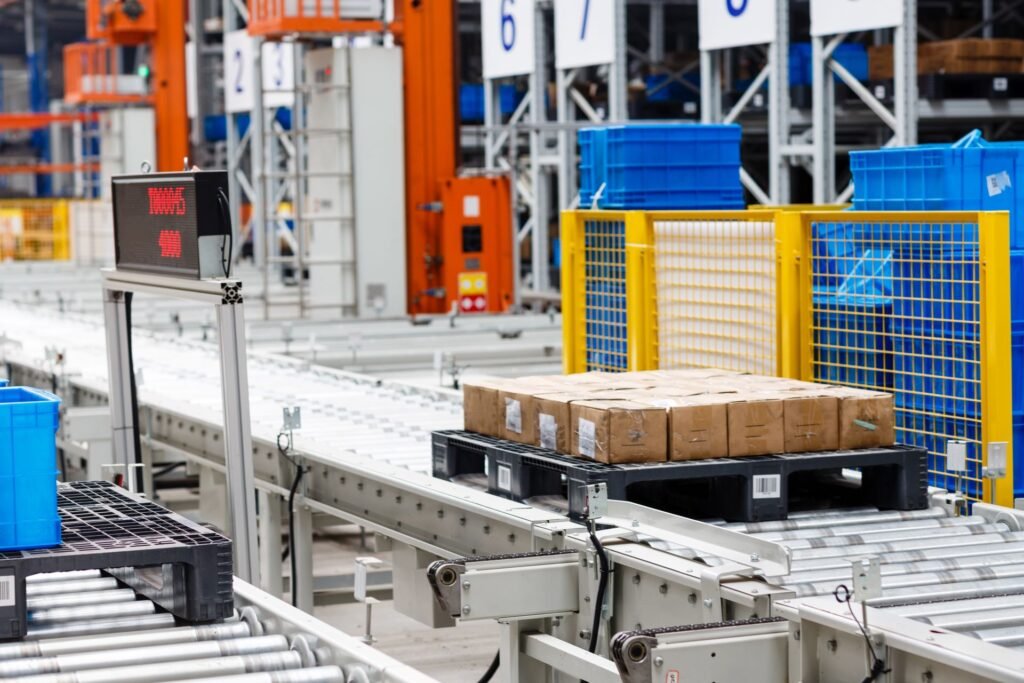 Production manager reviewing checkweigher batch statistics and individual package weight records for USDA FSIS compliance documentation