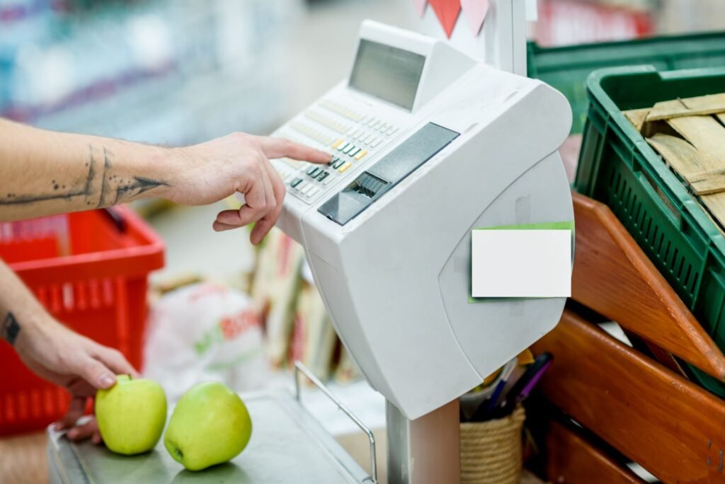 Grocery store deli counter with label printing scale printing thermal barcode label on pre-packaged deli meat for self-service case