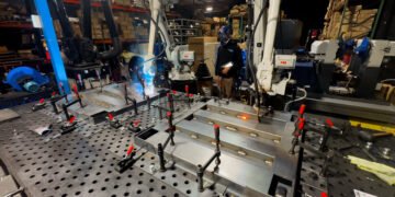 Heavy industrial floor scale in a manufacturing production facility used for batch weighing and quality control operations