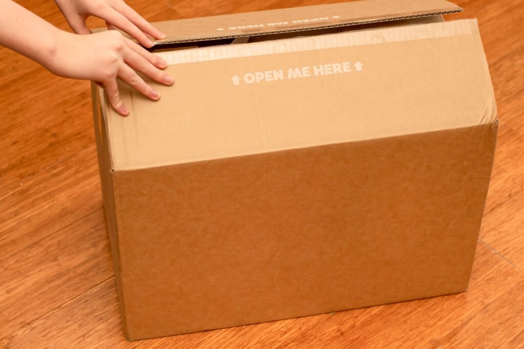 Large oversized shipping carton containing lightweight items illustrating when dimensional weight exceeds actual weight and becomes the billable weight