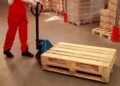 Side-by-side comparison of a U-frame pallet scale and a stationary floor scale with ramp in a warehouse environment