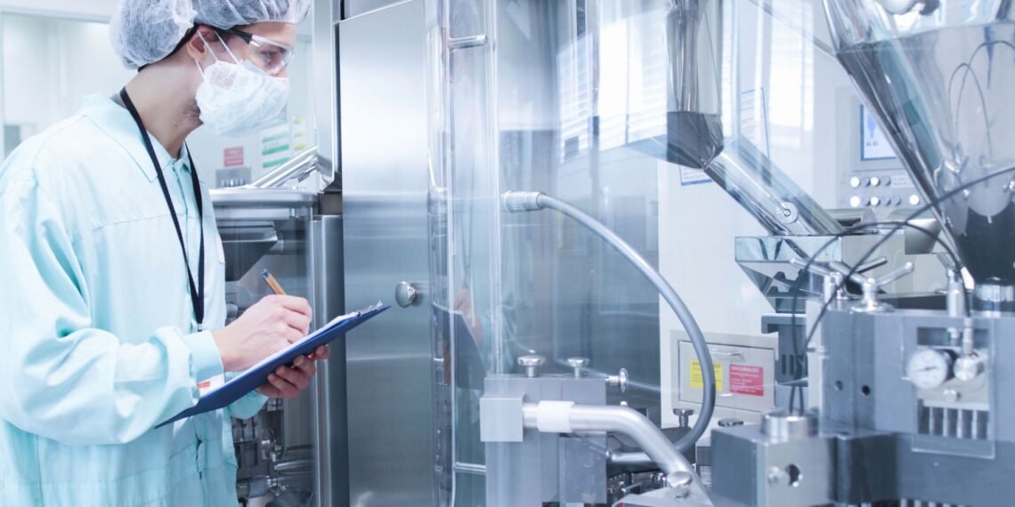 Pharmaceutical QC analyst documenting laboratory balance calibration records for GMP compliance audit in a regulated laboratory environment